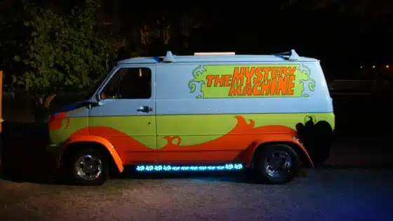 The blue, green and orange Mystery Machine van photographed at night at San Diego Comic-Con in 2013
